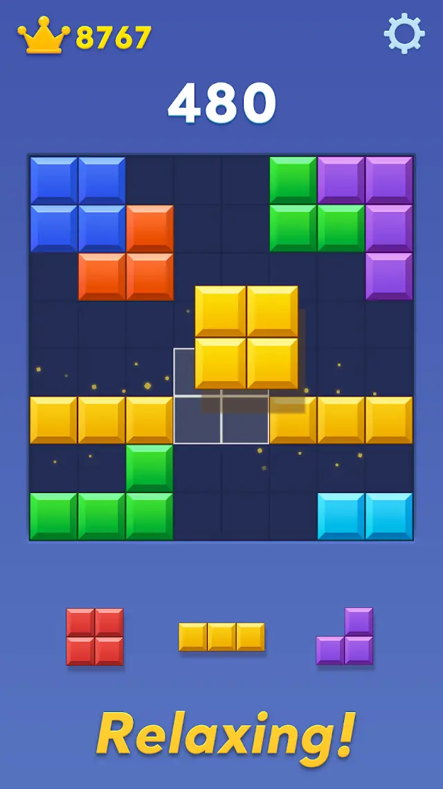 Grelha com o conjunto de três peças em espera na parte inferior — Block Blast!
